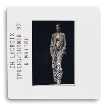 (FASHION) Binder containing 350 color slides portraying catwalk shots of Christian LaCroix prêt-à-porter fashion shows.